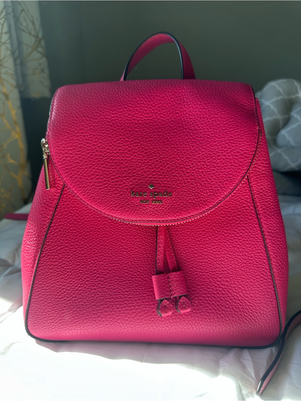kate spade hot pink Pebbled Leather Backpack with Tassel